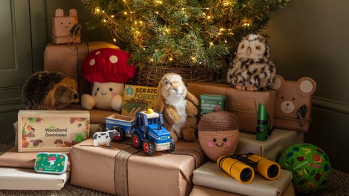 Christmas gifts for children, including stuffed animals and small toys, from the A/W 2025 collection